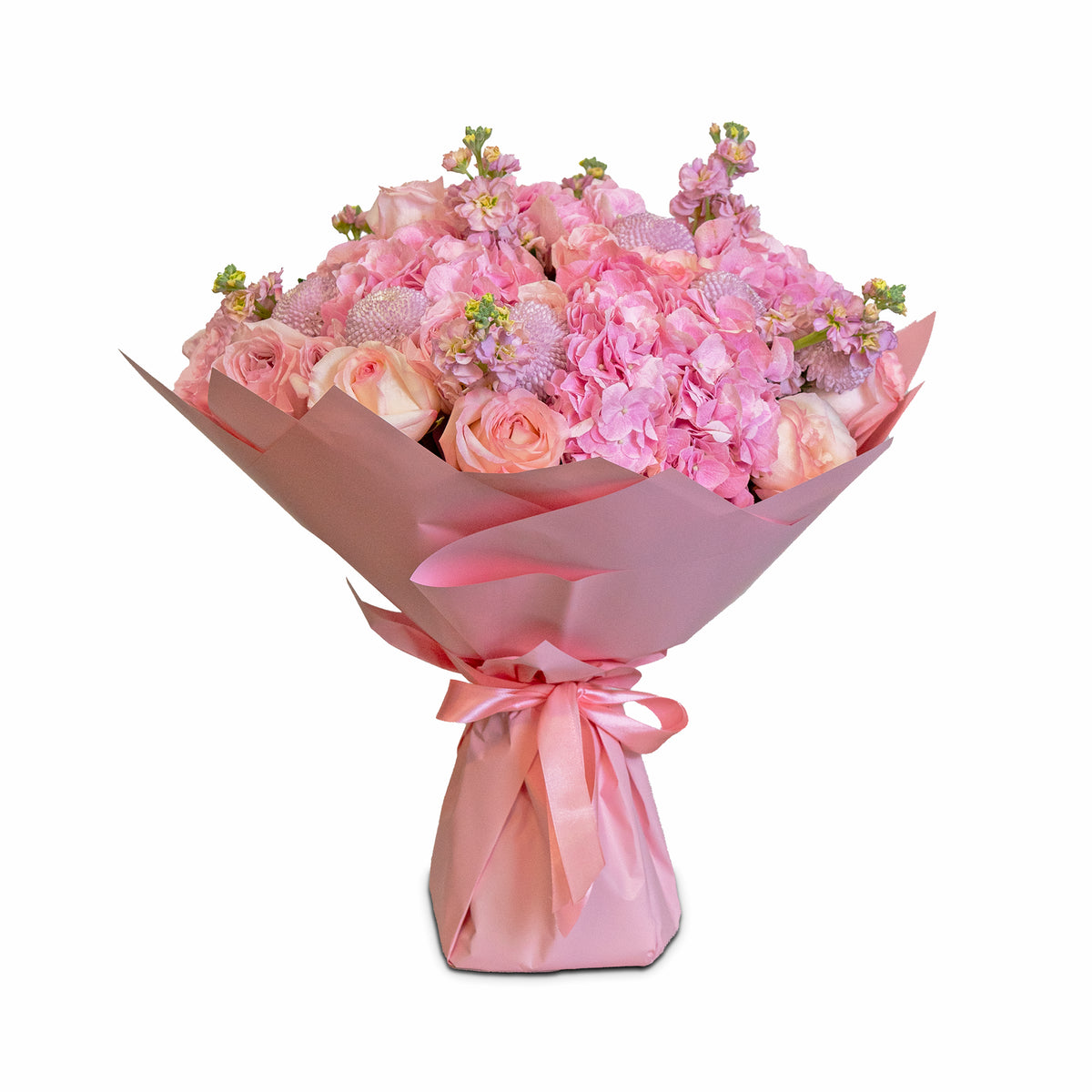 Bouquet of pink flowers wrapped in pink paper with a bow on a white background