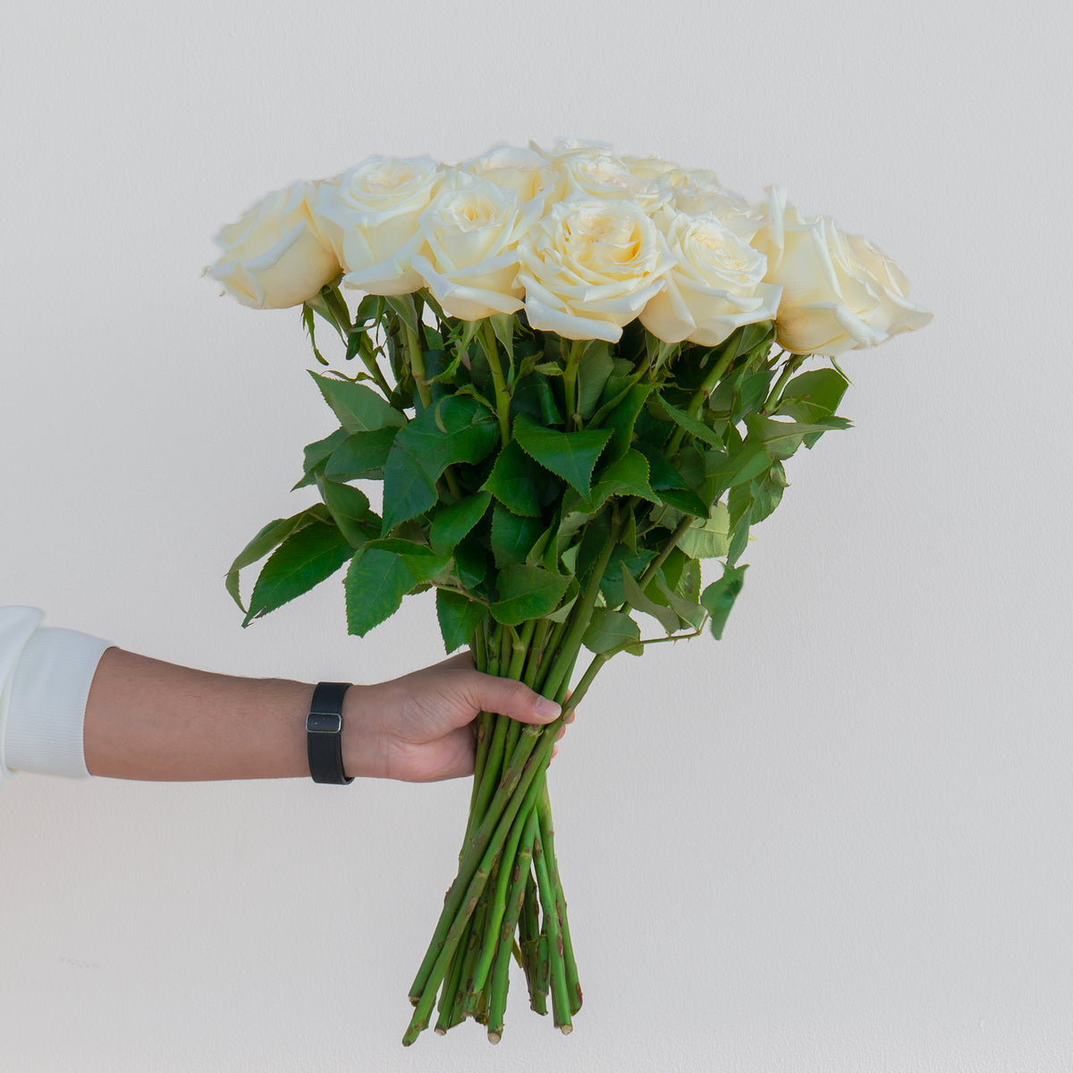 Candlelight Roses luxury flower arrangement with fresh flowers for gifting in Dubai UAE