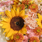 Bouquet of sunflowers and other flowers with a close-up view.