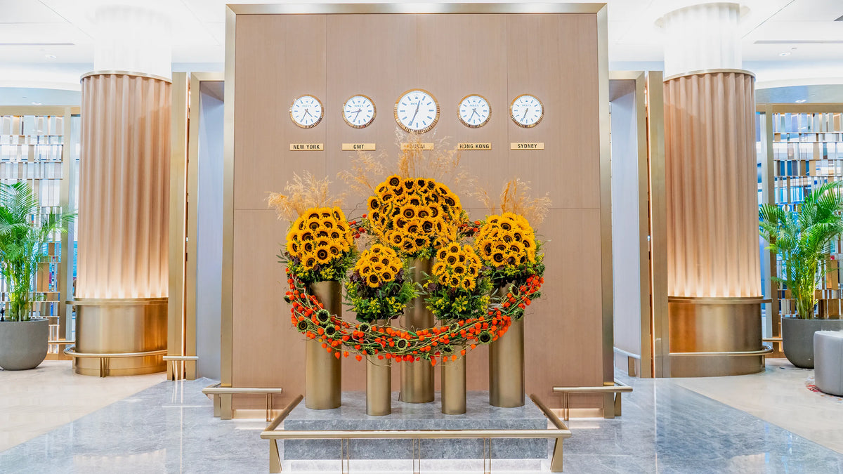 Sunflower installation titled The Solar Alliance at Emirates First Class Lounge, Dubai. A radiant circle of golden sunflowers 