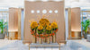 Sunflower installation titled The Solar Alliance at Emirates First Class Lounge, Dubai. A radiant circle of golden sunflowers 