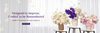Floral arrangements in vases on small tables with a white curtain background.
