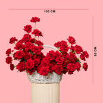 Red rose basket arrangement displayed on a pedestal, with visible size measurements showing 100 cm width and 85 cm height against a pink background.