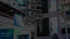 Exhibition stand with various brand logos and a chandelier.
