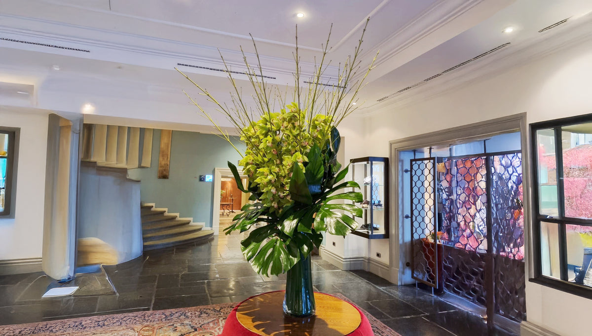 Hotel lobby floral display with an elegant hospitality atmosphere
