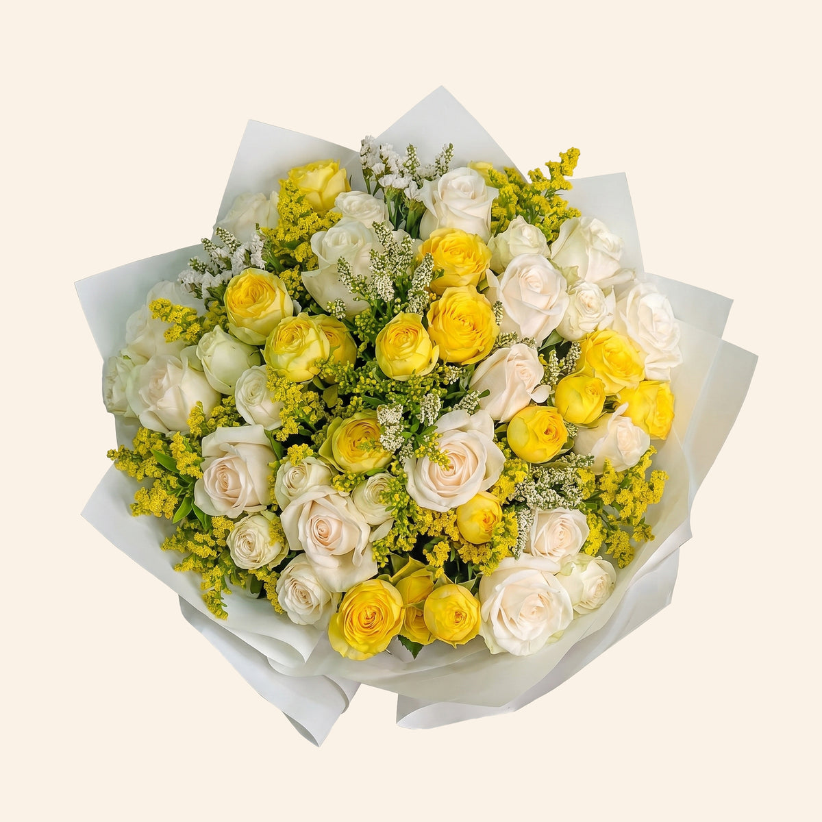 Bouquet of yellow and white flowers on a light background