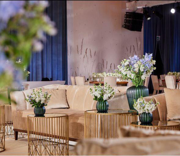 Wedding venue styled with floral arrangements and ceremony flowers