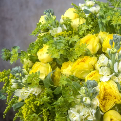 Yellow bouquet Radiant joy Sunshine-inspired flowers Handcrafted beauty Captivating arrangement