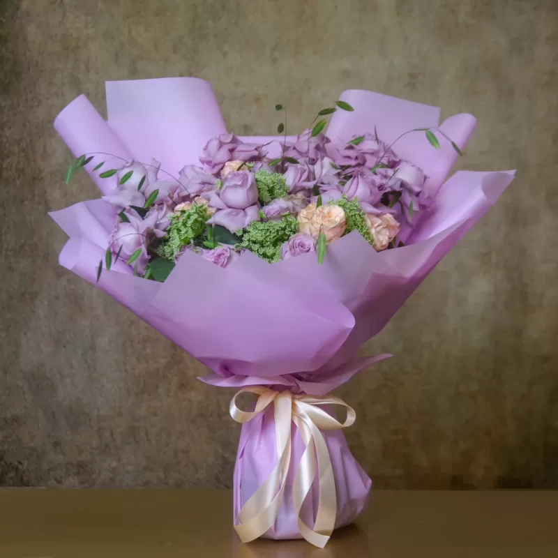 Amethyst bouquet Purple roses Purple orchids Lilac chrysanthemums Enchanting blooms Elegance and sophistication Captivating flower arrangement Symbolism of love Thoughtful gifting choice Special occasions